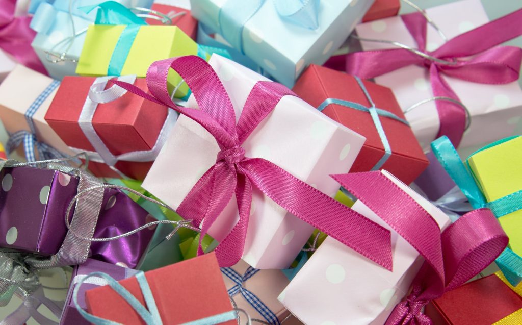 close up photo of assorted colored gift boxes
